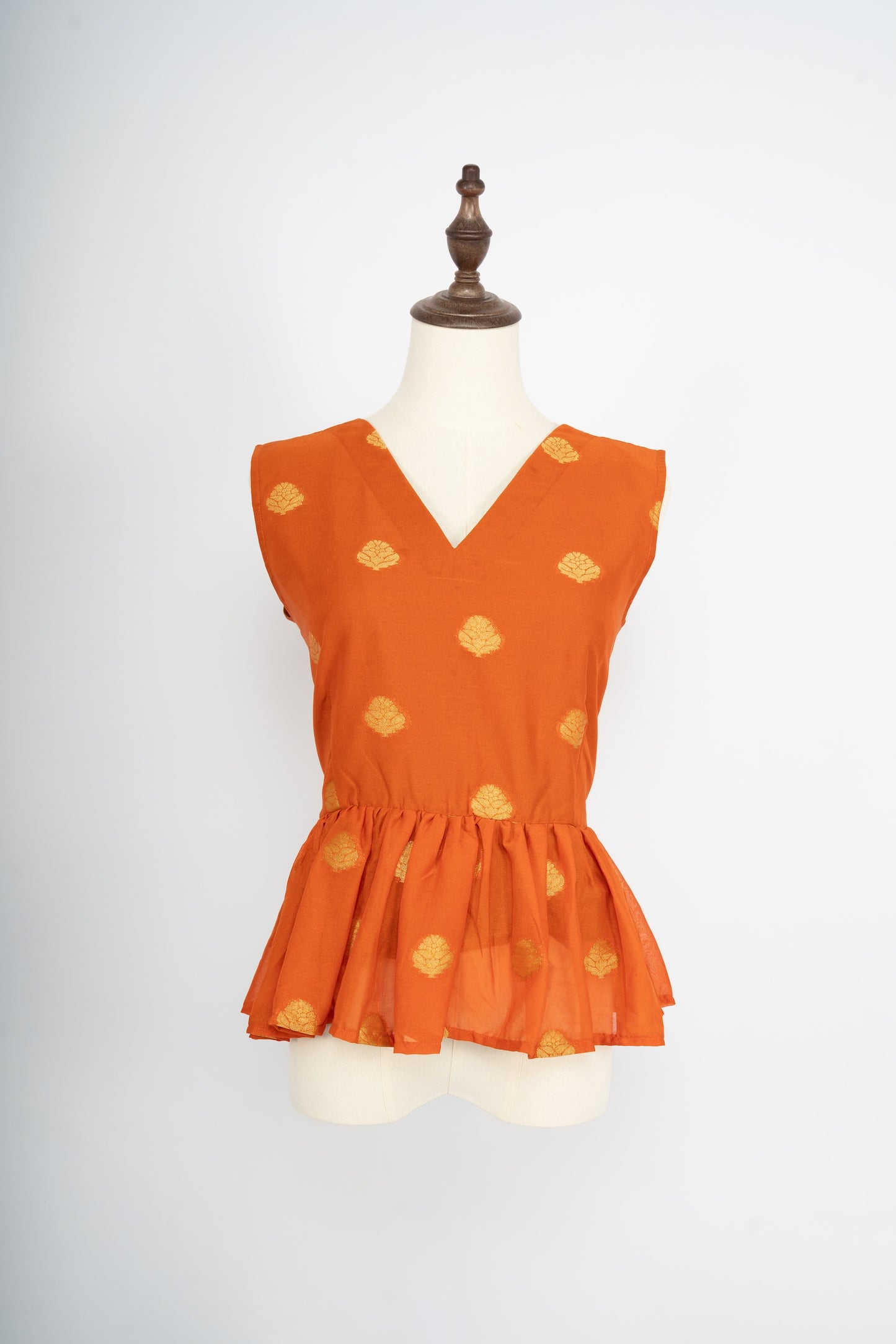 Burnt Orange Brocade Leaf Peplum Top
